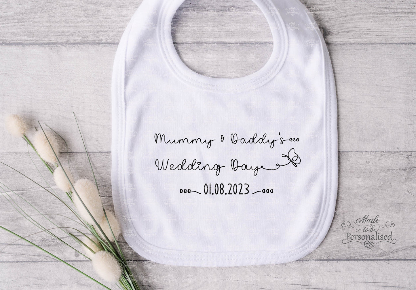 Mummy & Daddy's Wedding Day Baby Bib, personalised with the date of the wedding